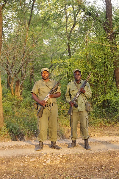 Sergio (left) and Verinca (right), two of the many rangers we have worked with in Gorongosa National Park - photograph by Lynn Lewis-Bevan