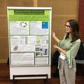 Megan Beardmore-Herd presenting a group project poster on 'Species Diversity in Ferns and Bryophytes in Yakushima, Japan' at Kyoto University in 2018