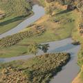 An aerial image showing a river running through Gorongosa National Park, taken mid-flight during the Oxford-Gorongosa Paleo-Primate Field School 2018